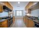 Kitchen with granite countertops and stainless steel appliances at 1735 Peachtree Ne St # 321, Atlanta, GA 30309