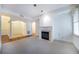 Spacious living room with gas fireplace and access to entryway at 1735 Peachtree Ne St # 321, Atlanta, GA 30309