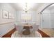 Elegant dining room with chandelier and hardwood floors at 1735 Peachtree Ne St # 321, Atlanta, GA 30309