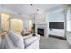 Spacious living room with fireplace and hardwood floors at 1735 Peachtree Ne St # 321, Atlanta, GA 30309
