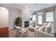 Bright living room with fireplace and access to balcony at 1735 Peachtree Ne St # 321, Atlanta, GA 30309