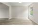 Simple dining room with vinyl flooring and large window at 3419 River Run Trl, Decatur, GA 30034