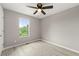 Well-lit bedroom with vinyl flooring and a ceiling fan at 3419 River Run Trl, Decatur, GA 30034