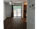 Dining room with hardwood floors and access to backyard at 5632 Stonington Trace Pkwy, Stone Mountain, GA 30087
