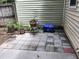Small patio with potted plants and pavers at 5632 Stonington Trace Pkwy, Stone Mountain, GA 30087