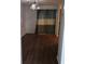 Bright dining room with hardwood floors and sliding glass doors at 5632 Stonington Trace Pkwy, Stone Mountain, GA 30087