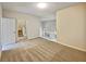 Spacious loft with carpeting and views to the lower level at 502 Brandywine Cir, Atlanta, GA 30350