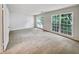 Spacious bedroom with neutral carpeting and large windows at 502 Brandywine Cir, Atlanta, GA 30350
