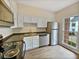 Kitchen with stainless steel appliances at 502 Brandywine Cir, Atlanta, GA 30350