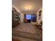 Bright dining room with hardwood floor and large area rug at 3749 Centerville Rosebud Rd, Snellville, GA 30039