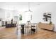 Modern dining room with an oval table and sleek light fixture at 589 Federal Se Ter, Atlanta, GA 30315