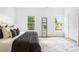 Bright and airy bedroom featuring hardwood floors and plenty of windows at 589 Federal Se Ter, Atlanta, GA 30315