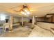 Partially finished basement with bar and storage at 3542 Lynfield Sw Dr, Atlanta, GA 30311
