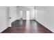 Spacious main bedroom with hardwood floors and access to bathroom at 5501 Somer Ridge Ct, Douglasville, GA 30134