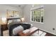 Spacious bedroom with large window and hardwood floors at 5501 Somer Ridge Ct, Douglasville, GA 30134