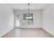 Bright breakfast nook with tile floors and backyard access at 5501 Somer Ridge Ct, Douglasville, GA 30134