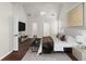Main bedroom with hardwood floors and access to bathroom and laundry at 5501 Somer Ridge Ct, Douglasville, GA 30134