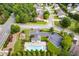 Community pool, playground, and ample parking are featured in this aerial view at 5501 Somer Ridge Ct, Douglasville, GA 30134