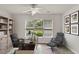 Home office with built-in shelving and large window at 5501 Somer Ridge Ct, Douglasville, GA 30134