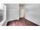 Bright bedroom with double door closet and hardwood floors at 5501 Somer Ridge Ct, Douglasville, GA 30134
