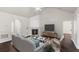Living room with fireplace and built-in shelving at 5501 Somer Ridge Ct, Douglasville, GA 30134