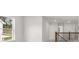 Bright bedroom with a hall view and natural light at 1698 Lacebark Elm Way, Lawrenceville, GA 30045