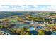 Community overview showcasing new homes and green space at 1698 Lacebark Elm Way, Lawrenceville, GA 30045