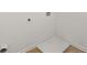 Simple laundry room with washer and dryer hookups at 1698 Lacebark Elm Way, Lawrenceville, GA 30045