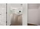 Hallway offering access to kitchen and other rooms at 1698 Lacebark Elm Way, Lawrenceville, GA 30045