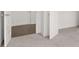 Bedroom with neutral carpeting and double door closet at 1698 Lacebark Elm Way, Lawrenceville, GA 30045