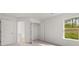 Bedroom with closet, carpet, and window at 1698 Lacebark Elm Way, Lawrenceville, GA 30045