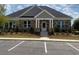 Community clubhouse with stone exterior and landscaping at 1698 Lacebark Elm Way, Lawrenceville, GA 30045