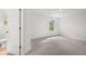 Simple bedroom with carpet and access to bathroom at 1698 Lacebark Elm Way, Lawrenceville, GA 30045