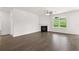Spacious living room with fireplace and hardwood floors at 1698 Lacebark Elm Way, Lawrenceville, GA 30045