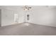 Main bedroom with ensuite bathroom access at 1698 Lacebark Elm Way, Lawrenceville, GA 30045