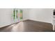 Bright dining area with hardwood floors and access to patio at 1698 Lacebark Elm Way, Lawrenceville, GA 30045