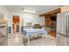 Kitchen with stainless steel appliances, and view into living room at 2841 Upper Sweetwater Se Trl, White, GA 30184