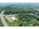 Aerial view of property near roadways and businesses at 2841 Upper Sweetwater Se Trl, White, GA 30184