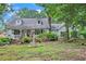 Charming one-story home nestled amongst lush trees with a stone facade at 2841 Upper Sweetwater Se Trl, White, GA 30184