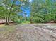 Open, partially cleared land with a gravel area at 2841 Upper Sweetwater Se Trl, White, GA 30184
