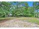 Large backyard with mature trees and open space at 2841 Upper Sweetwater Se Trl, White, GA 30184