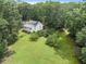 House with large backyard and wooded area at 2841 Upper Sweetwater Se Trl, White, GA 30184