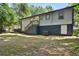 Spacious backyard with a wooden deck and stairs at 163 Glenrose Sw Cir, Atlanta, GA 30354