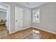 Bright bedroom with hardwood floors and neutral walls at 163 Glenrose Sw Cir, Atlanta, GA 30354