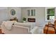 Living room with fireplace, stylish armchairs and sofa at 163 Glenrose Sw Cir, Atlanta, GA 30354