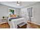 Bedroom with hardwood floors and a ceiling fan at 163 Glenrose Sw Cir, Atlanta, GA 30354