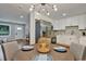 Modern white kitchen with stainless steel appliances and breakfast bar at 163 Glenrose Sw Cir, Atlanta, GA 30354