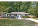 Charming single-story home with a well-maintained lawn at 163 Glenrose Sw Cir, Atlanta, GA 30354