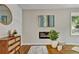 Living room with hardwood floors, fireplace, and stylish decor at 163 Glenrose Sw Cir, Atlanta, GA 30354