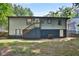 Spacious backyard with wooden deck and stairs at 163 Glenrose Sw Cir, Atlanta, GA 30354